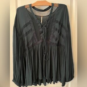 Women’s Free people blouse.